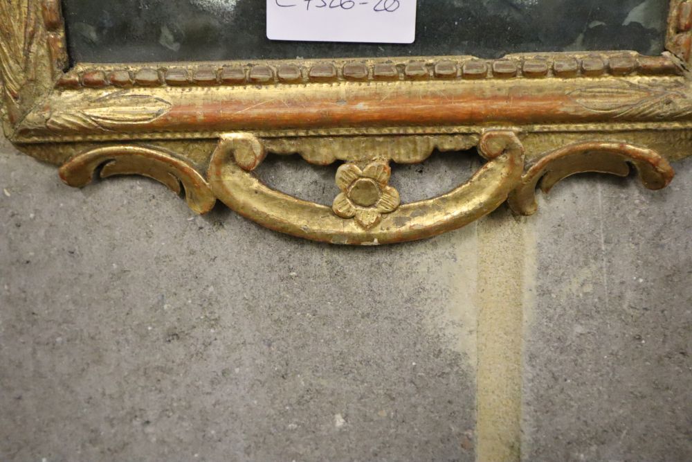 A gilt framed wall mirror, 26 x 51cm